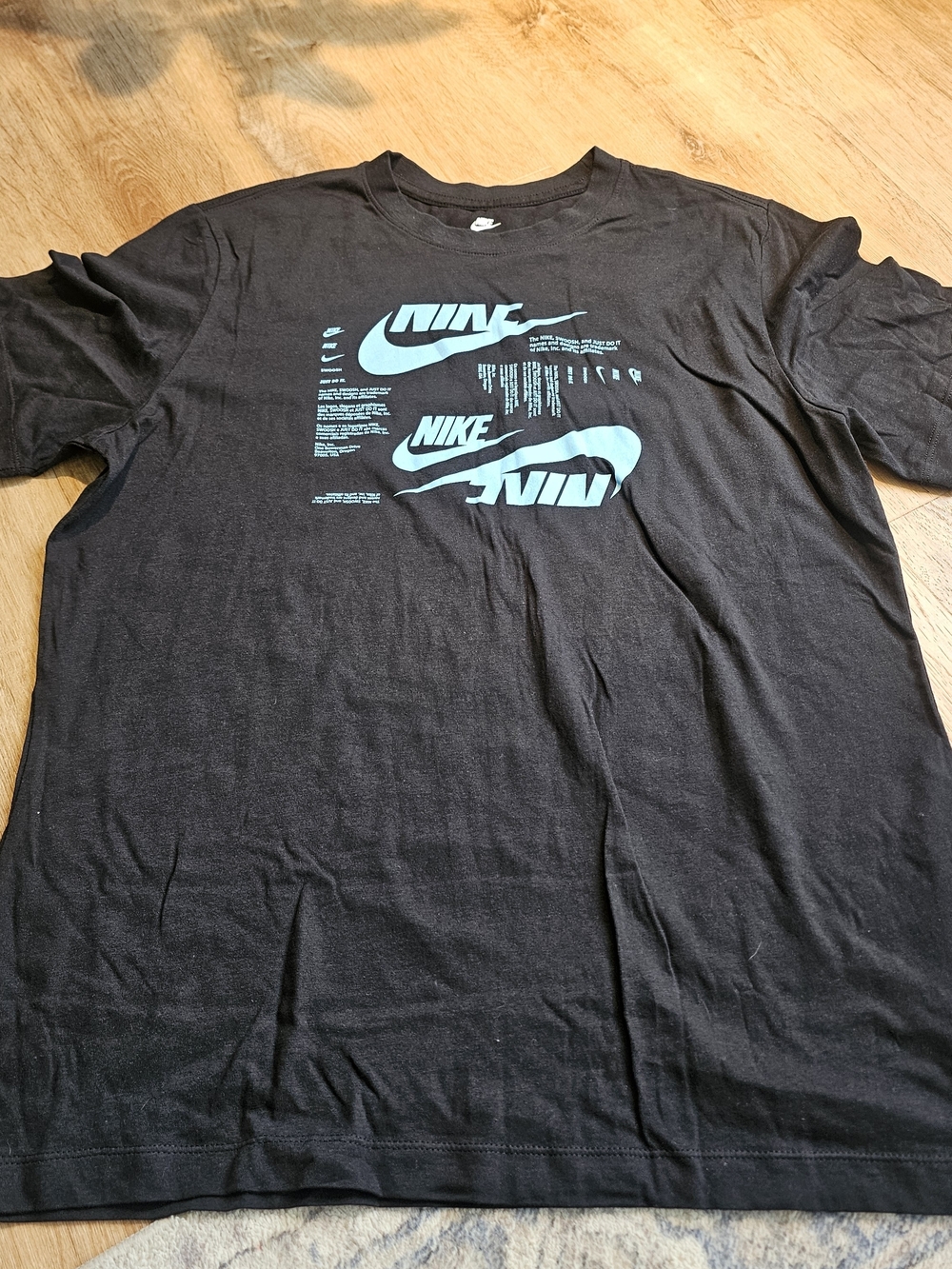 Nike Black T-Shirt with Teal Graphic Logos